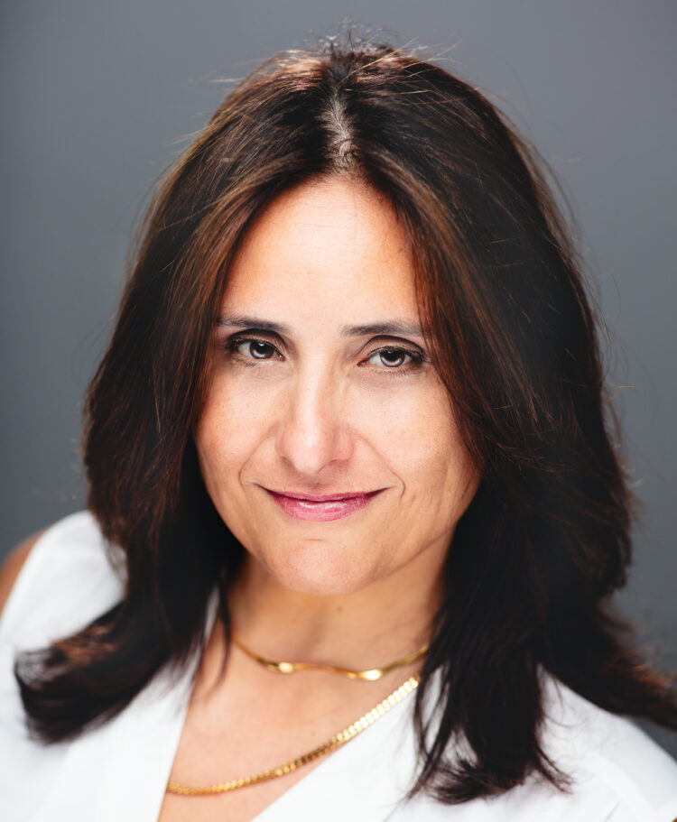 A professional headshot of Laila Shereen Sakr 